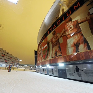 Winter's Embrace: Arsenal's Emirates Stadium Transformed by Snow