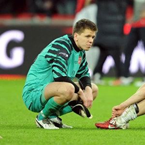 Wojciech Szczesny and Jack Wilshere (Arsenal) dejected after the matc. Arsenal 1