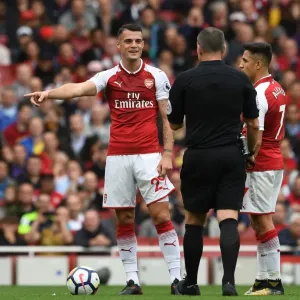 Xhaka and Referee Share a Light-Hearted Moment Amidst Arsenal's Battle Against Brighton Xhaka and Referee Share a Light-Hearted Moment Amidst Arsenal's Battle Against Brighton