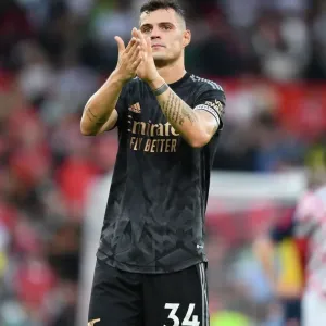 Xhaka Salutes Arsenal Fans: Manchester United vs Arsenal FC - Premier League 2022-23 Xhaka Salutes Arsenal Fans: Manchester United vs Arsenal FC - Premier League 2022-23