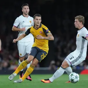 Xhaka vs. Fransson: A Battle for Ball Possession in Arsenal's UEFA Champions League Clash against FC Basel Xhaka vs. Fransson: A Battle for Ball Possession in Arsenal's UEFA Champions League Clash against FC Basel