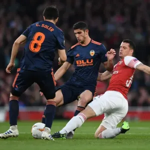 Xhaka vs Guedes: A Midfield Showdown in Arsenal's Europa League Battle with Valencia
