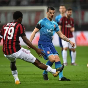 Xhaka vs. Kessie: Battle in the Midfield - AC Milan vs. Arsenal, UEFA Europa League Xhaka vs. Kessie: Battle in the Midfield - AC Milan vs. Arsenal, UEFA Europa League