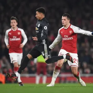 Xhaka vs Lingard: Intense Battle in Arsenal v Manchester United Premier League Clash Xhaka vs Lingard: Intense Battle in Arsenal v Manchester United Premier League Clash
