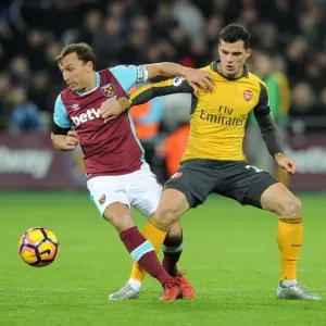 Xhaka vs. Noble: Intense Battle in West Ham United vs. Arsenal Premier League Clash Xhaka vs. Noble: Intense Battle in West Ham United vs. Arsenal Premier League Clash