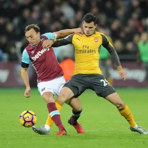 Xhaka vs Noble: Intense Battle in West Ham United vs Arsenal Premier League Clash Xhaka vs Noble: Intense Battle in West Ham United vs Arsenal Premier League Clash