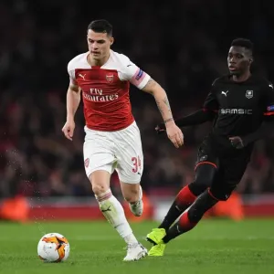 Xhaka vs Sarr: A Europa League Battle – Arsenal's Granit Xhaka and Stade Rennais Ismaila Sarr Clash in Dramatic Showdown