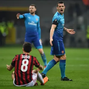 Xhaka vs Suso: Intense Rivalry in the UEFA Europa League Clash between AC Milan and Arsenal Xhaka vs Suso: Intense Rivalry in the UEFA Europa League Clash between AC Milan and Arsenal