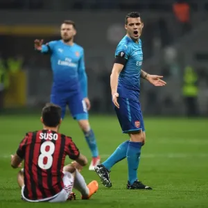 Xhaka vs. Suso: Intense Rivalry in the UEFA Europa League Clash Between AC Milan and Arsenal Xhaka vs. Suso: Intense Rivalry in the UEFA Europa League Clash Between AC Milan and Arsenal