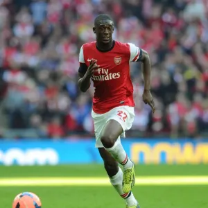 Yaya Sanogo in Action: Arsenal's FA Cup Semi-Final Battle against Wigan Athletic, 2014 Yaya Sanogo in Action: Arsenal's FA Cup Semi-Final Battle against Wigan Athletic, 2014