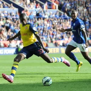 Yaya Sanogo (Arsenal) Wes Morgan (Leicester). Leicester City 1: 1 Arsenal. Barclays Premier League