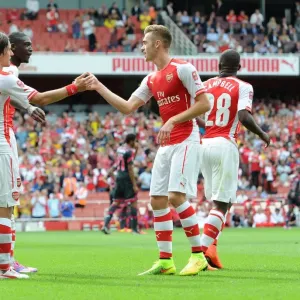 Yaya Sanogo celebrates scoring his 2nd goal with Tomas Rosicky and Calum Chambers Yaya Sanogo celebrates scoring his 2nd goal with Tomas Rosicky and Calum Chambers