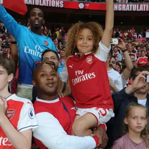 A young Arsenal fan in print, taken at Wembley Stadium