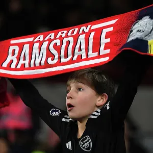 Young Arsenal Fan Celebrates Victory: Brentford FC vs. Arsenal FC, Premier League 2023-24