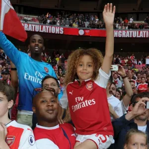 A young Arsenal fan in print, taken at Wembley Stadium