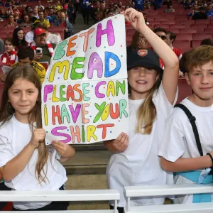 Young Arsenal Fans Anticipate Arsenal Women vs. Chelsea Women FA WSL Match at Emirates Stadium