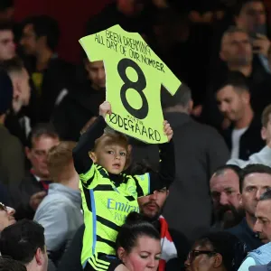 Young Arsenal Fan's Anticipation: RC Lens vs. Arsenal, UEFA Champions League 2023/24 Young Arsenal Fan's Anticipation: RC Lens vs. Arsenal, UEFA Champions League 2023/24