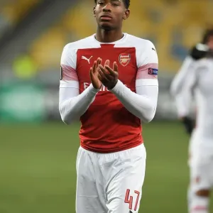 Zech Medley Celebrates with Arsenal Fans after Europa League Victory over Vorskla Poltava