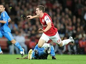 Aaran Ramsey (Arsenal) Alou Diarra (Marseille). Arsenal 0: 0 Marseille. UEFA Champions League