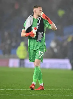Brighton And Hove Albion V Arsenal 2021-22 Prints: Aaron Ramsdale Celebrates with Arsenal Fans After Brighton Victory