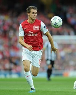 Arsenal v Udinese 2011-12 Collection: Aaron Ramsey in Action: Arsenal vs. Udinese, UEFA Champions League Play-Off 2011