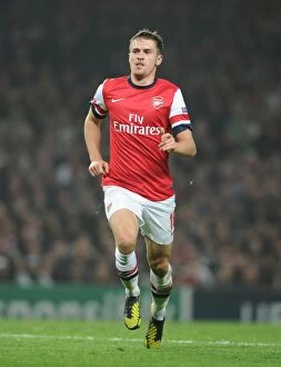 Images Dated 24th October 2012: Aaron Ramsey in Action: Arsenal vs. Schalke 04, UEFA Champions League 2012-13