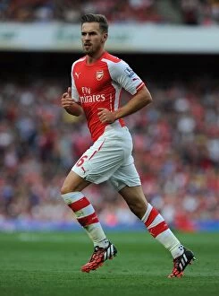 Images Dated 16th August 2014: Aaron Ramsey in Action: Arsenal vs Crystal Palace, Premier League 2014/15