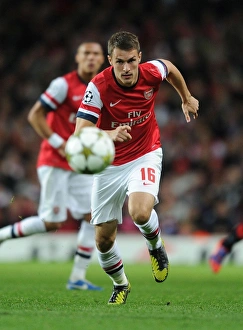 Uefa Champions Laegue Prints: Aaron Ramsey in Action: Arsenal vs Olympiacos, UEFA Champions League 2012-13