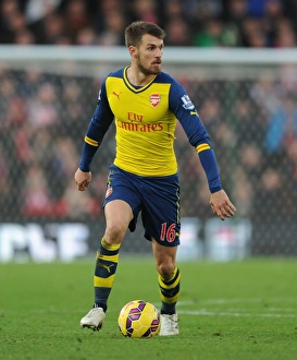 Stoke City V Arsenal 2014-15 Prints: Aaron Ramsey in Action: Arsenal vs Stoke City, Premier League 2014-15