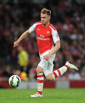 Images Dated 11th May 2015: Aaron Ramsey in Action: Arsenal vs Swansea City, Premier League 2014-15