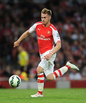 Arsenal Swansea City 2014/15 Prints: Aaron Ramsey in Action: Arsenal vs Swansea City, Premier League 2014-15