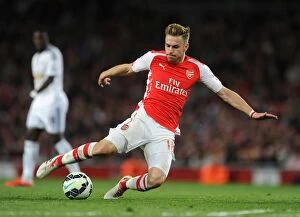 Images Dated 11th May 2015: Aaron Ramsey in Action: Arsenal vs Swansea City, Premier League 2014/15