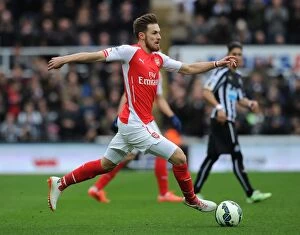 Images Dated 25th February 2009: Aaron Ramsey in Action: Newcastle United vs. Arsenal, Premier League 2014-2015