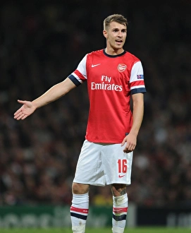 Arsenal V Napoli 2013-14 Prints: Aaron Ramsey: In Action Against SSC Napoli (Arsenal vs)