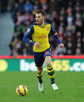 Stoke City V Arsenal 2014-15 Prints: Aaron Ramsey in Action: Stoke City vs Arsenal, Premier League 2014-15