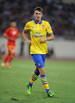 Vietnam V Arsenal 2013-14 Prints: Aaron Ramsey in Action: Vietnam vs. Arsenal (2013-14)