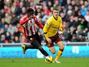 Images Dated 9th February 2013: Aaron Ramsey (Arsenal) Alfred N Diaye (Sunderland). Sunderland 0: 1 Arsenal. Barclays Premier League