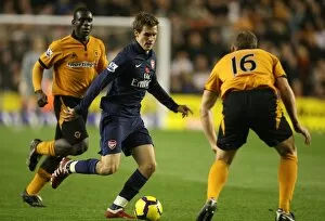Wolverhampton Wanderers v Arsenal 2009-10 Collection: Aaron Ramsey (Arsenal) Christophe Berra (Wolves)