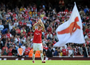 Aaron Ramsey (Arsenal) clpas the fans at the end of the match. Arsenal 1 Aaron Ramsey (Arsenal) clpas the fans at the end of the match. Arsenal 1