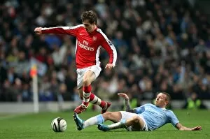 Manchester City v Arsenal - Carling Cup 2009-10 Collection: Aaron Ramsey (Arsenal) Craig Bellamy (Man City). Manchester City 3: 0 Arsenal