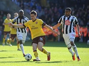 Images Dated 19th March 2011: Aaron Ramsey (Arsenal) Jerome Thomas (WBA). West Bromwich Albion 2: 2 Arsenal