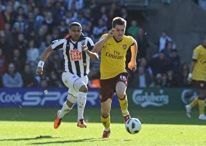 Images Dated 19th March 2011: Aaron Ramsey (Arsenal) Jerome Thomas (WBA). West Bromwich Albion 2: 2 Arsenal
