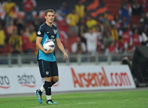 Malaysia XI V Arsenal Prints: Aaron Ramsey (Arsenal). Malaysia XI 0: 4 Arsenal, Bukit Jalil Stadium, Kuala Lumpur