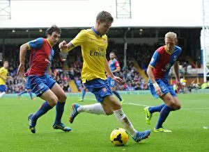 Images Dated 26th October 2013: Aaron Ramsey (Arsenal) Mile Jadinak and Dean Moxey (Palace). Crystal Palace 0: 2 Arsenal