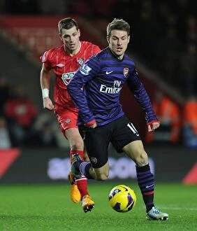 Southampton v Arsenal 2012-13 Collection: Aaron Ramsey (Arsenal) Morgan Schneiderlin (Southampton). Southampton 1: 1 Arsenal