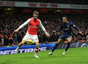 Arsenal V Southampton 2014-15 Prints: Aaron Ramsey (Arsenal) Nathaniel Clyne (Southampton). Arsenal 1: 0 Southampton. Barclays