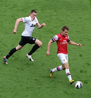 Aaron Ramsey (Arsenal) Phil Jones (Man Utd). Arsenal 1:1 Manchester United. Barclays Premier League Aaron Ramsey (Arsenal) Phil Jones (Man Utd). Arsenal 1:1 Manchester United. Barclays Premier League