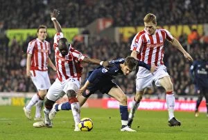 Images Dated 27th February 2010: Aaron Ramsey (Arsenal) Ryan Shawcross and Abdoulaye Faye (Stoke). Stoke City 1: 3 Arsenal