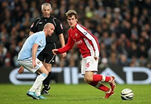 Manchester City v Arsenal - Carling Cup 2009-10 Collection: Aaron Ramsey (Arsenal) Stephen Ireland (Man City). Manchester City 3: 0 Arsenal