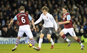Aaron Ramsey (Arsenal) Steven Caldwell (Burnley). Burnley 1:1 Arsenal, Barclays Premier League Aaron Ramsey (Arsenal) Steven Caldwell (Burnley). Burnley 1:1 Arsenal, Barclays Premier League